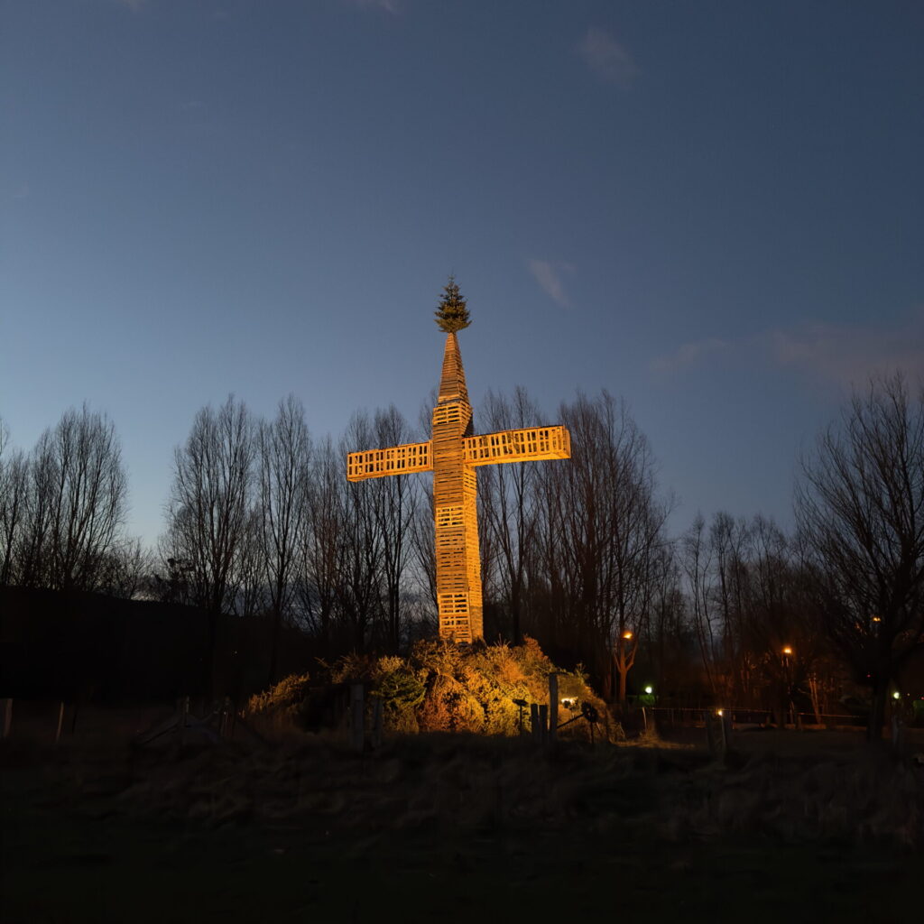 A cross made of wooden pallets, prepared for the Burgbrennen celebration in Luxembourg.